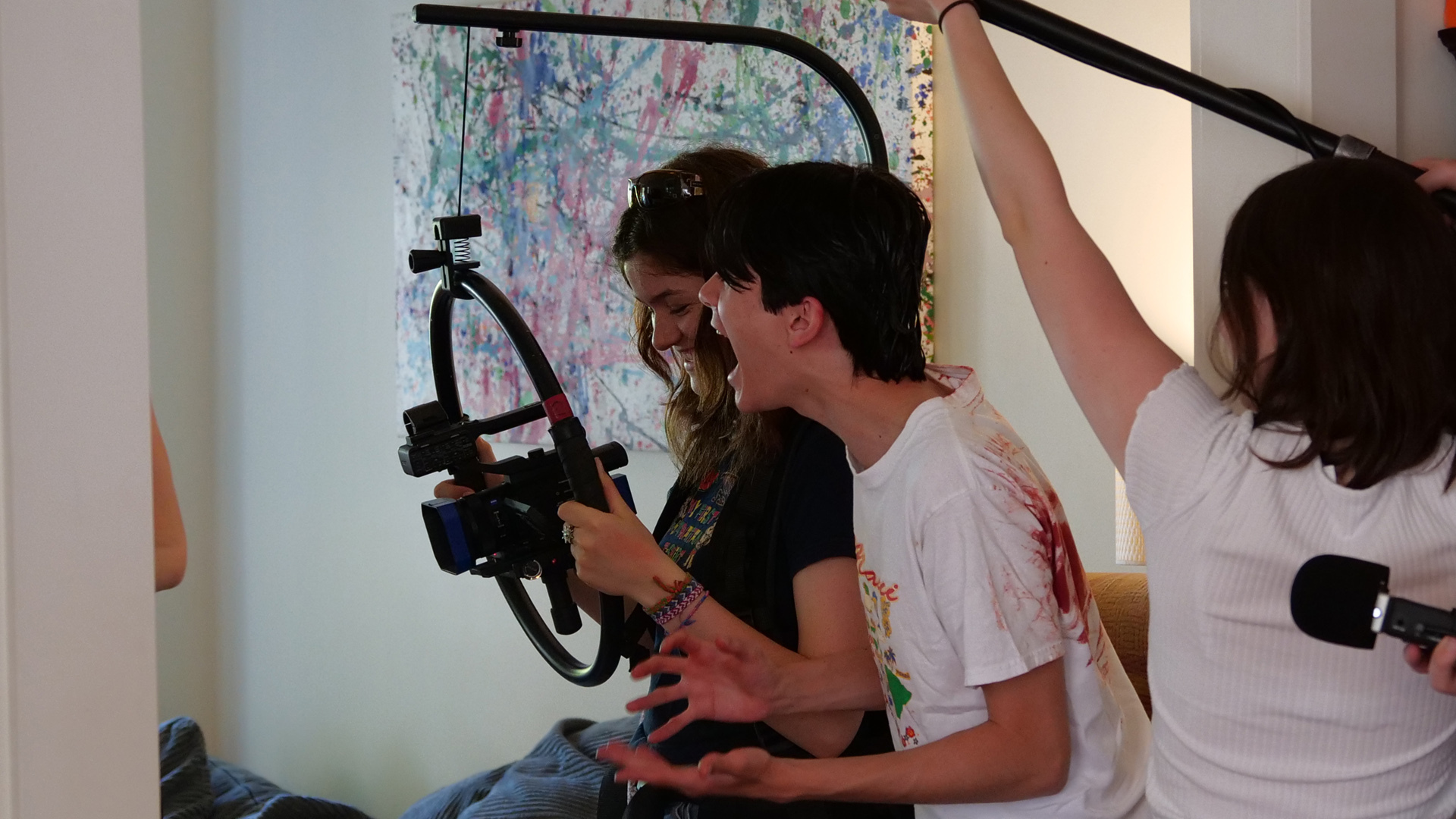 Three participants filming